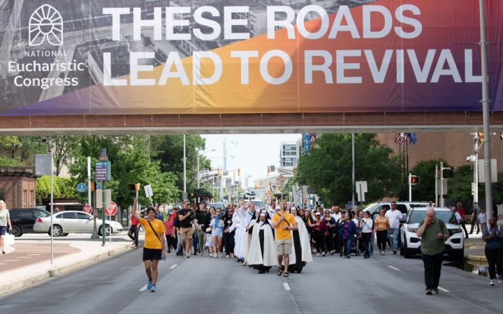 Pilgrims 'take Jesus to the streets' in tough trek to eucharistic congress